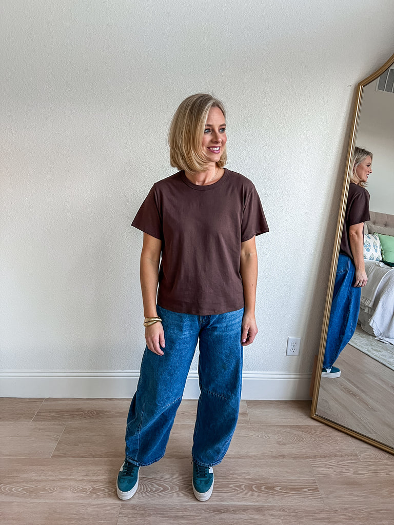 Chocolate brown crew neck tee with short sleeves and a relaxed fit, perfect for casual wear or layering. Ideal for those seeking a versatile and stylish boutique basic.
