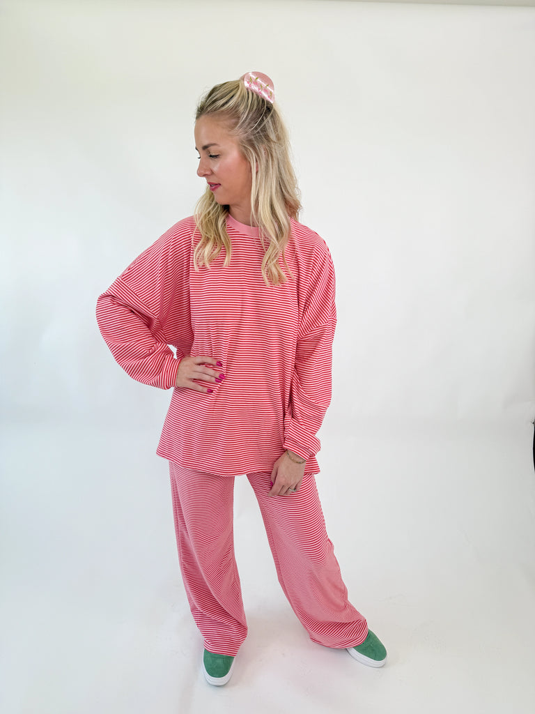 Set in pink and white stripes with an oversized relaxed fit
