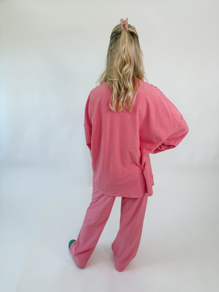 Set in pink and white stripes with an oversized relaxed fit