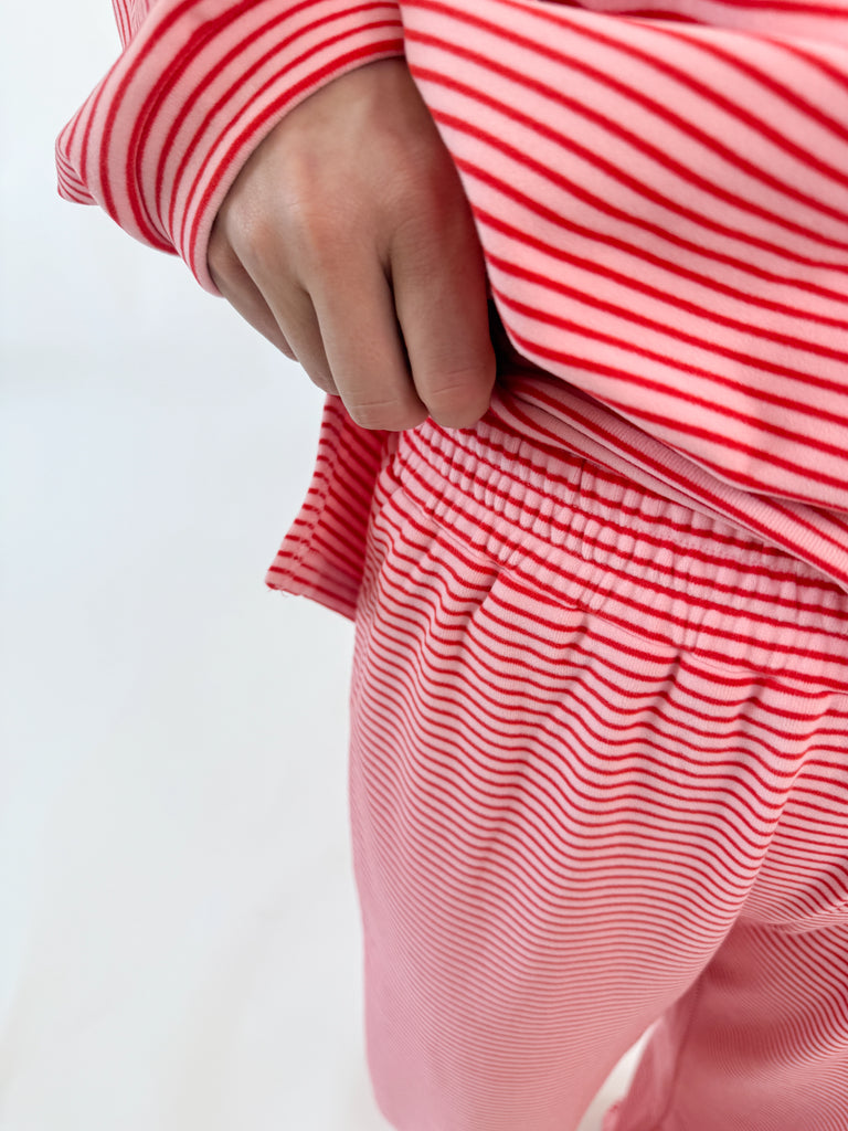 Set in pink and white stripes with an oversized relaxed fit