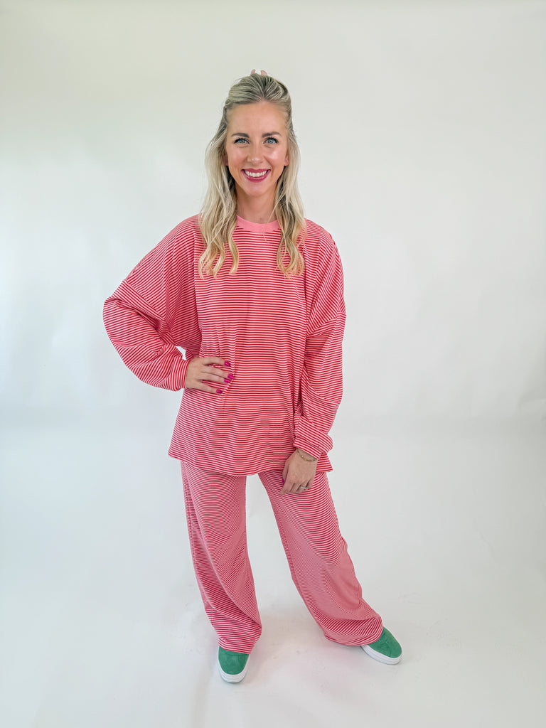 Set in pink and white stripes with an oversized relaxed fit