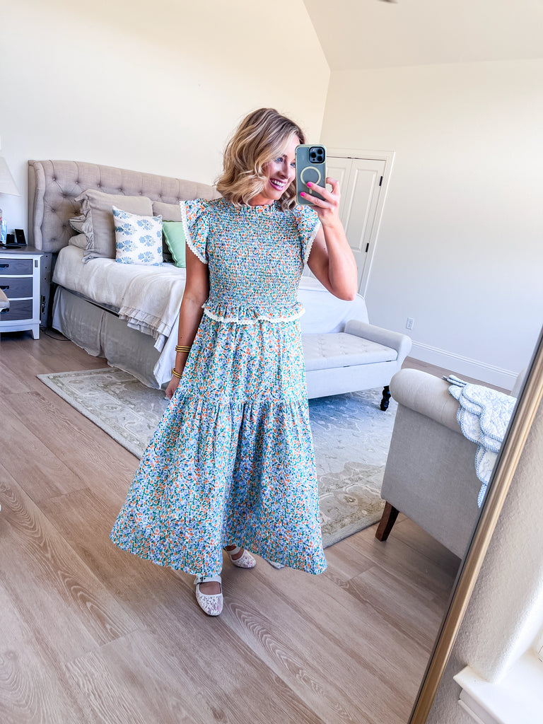 Pastel floral smocked midi dress with flutter sleeves and lace trim