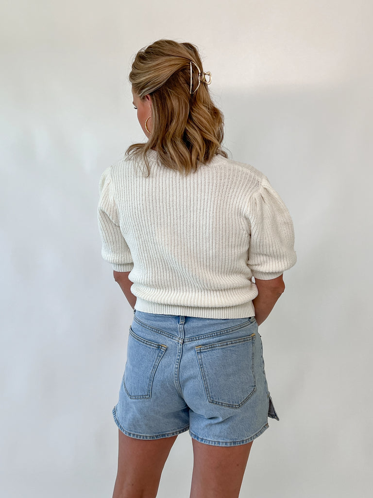 cream puff sleeve knit sweater with lace bow details on front