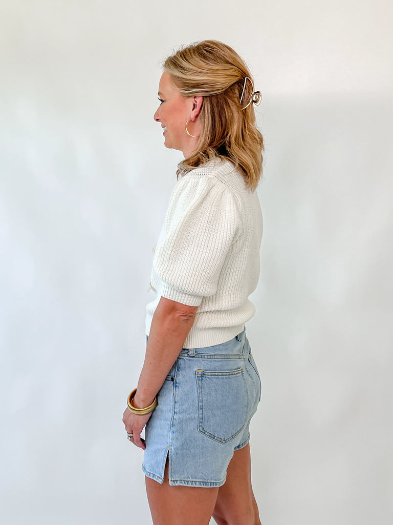 cream puff sleeve knit sweater with lace bow details on front