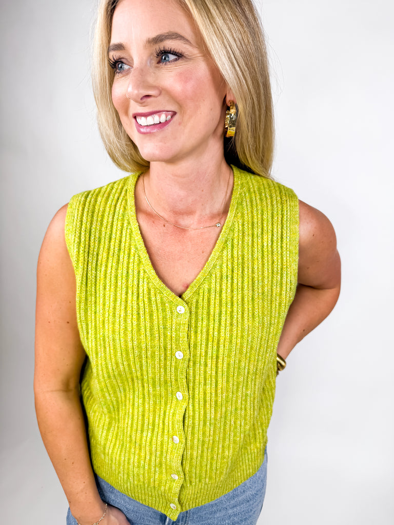 model wearing lime green ribbed knit vest with button front
