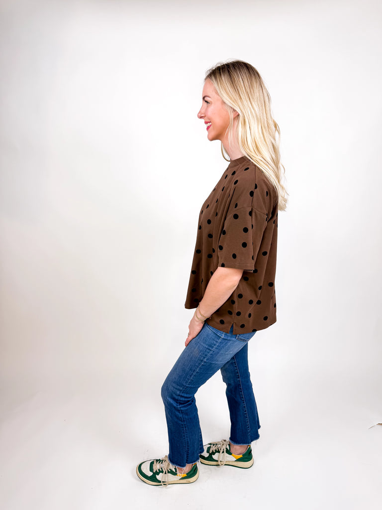 model wearing chocolate brown tee with black polka dots
