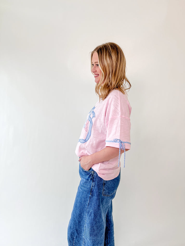 Pink oversized Stars & Bows tee with gingham 'Merica graphic and blue bow