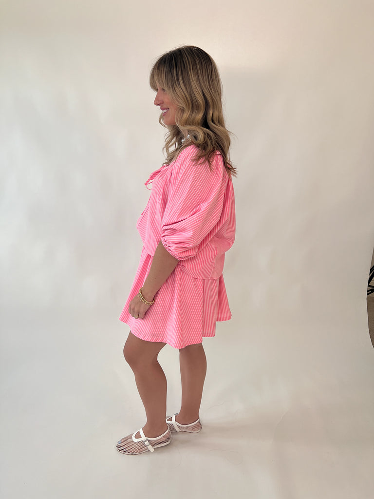 pink off-the-shoulder striped top with front tie detail