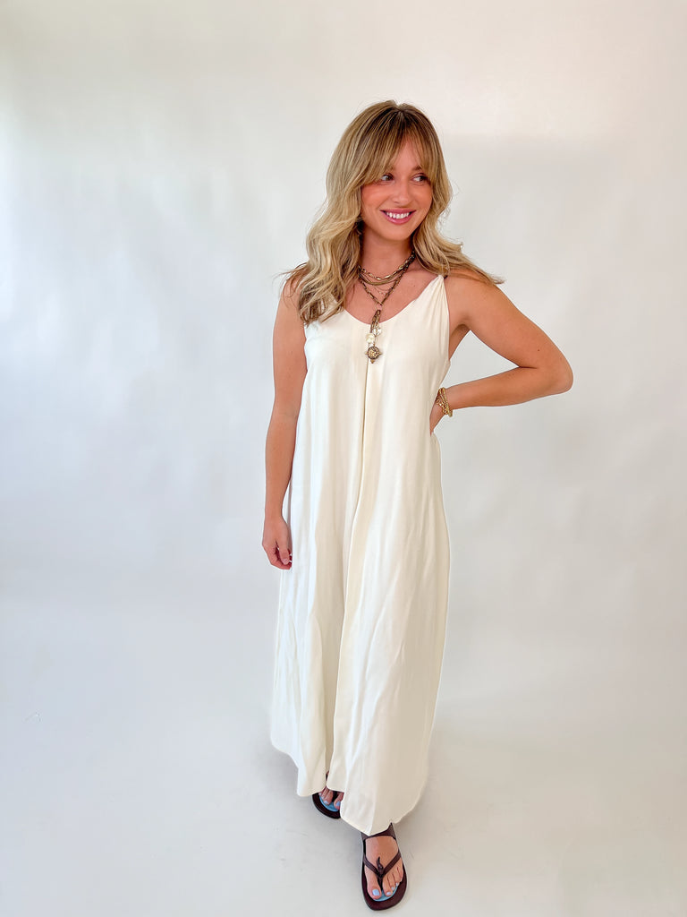 cream maxi dress with bow tie back