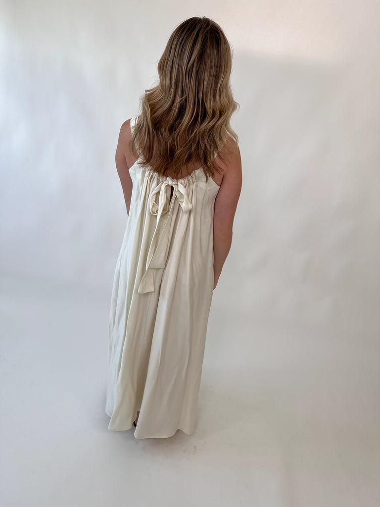 cream maxi dress with bow tie back