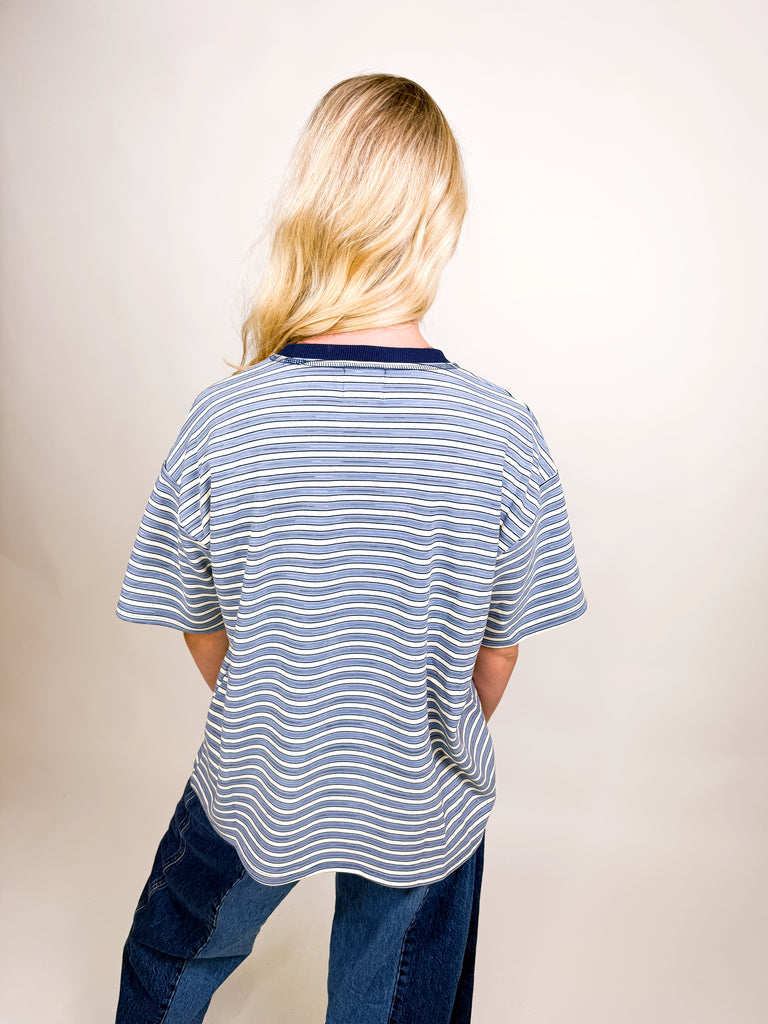 Blue and white striped velour short sleeve top with navy neckline