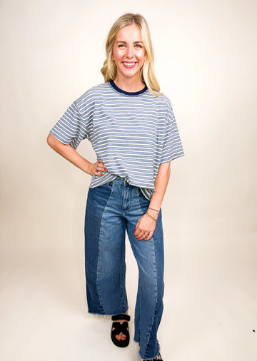 Blue and white striped velour short sleeve top with navy neckline