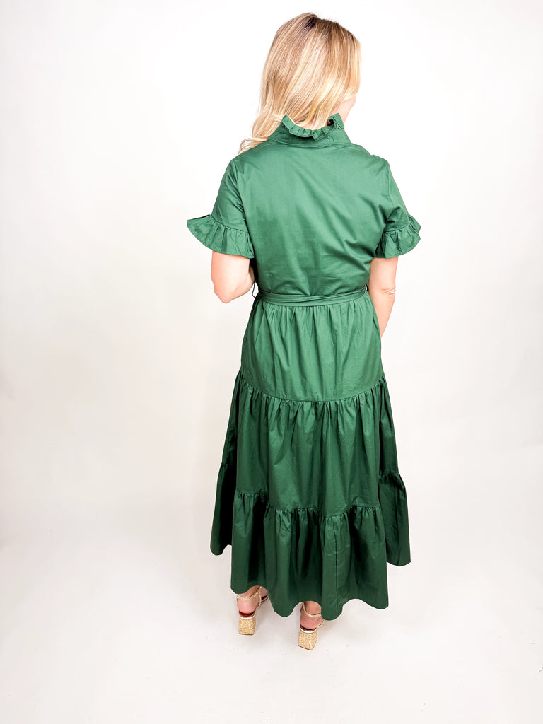 Green midi dress with high ruffle neckline, flutter sleeves, and waist tie