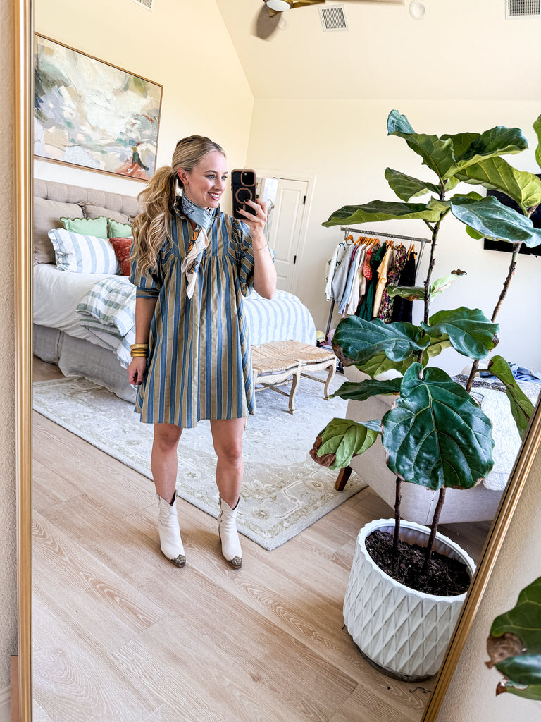 The Marlowe Stripe Dress featuring blue and camel vertical stripes with a ruffled neckline and puff sleeves