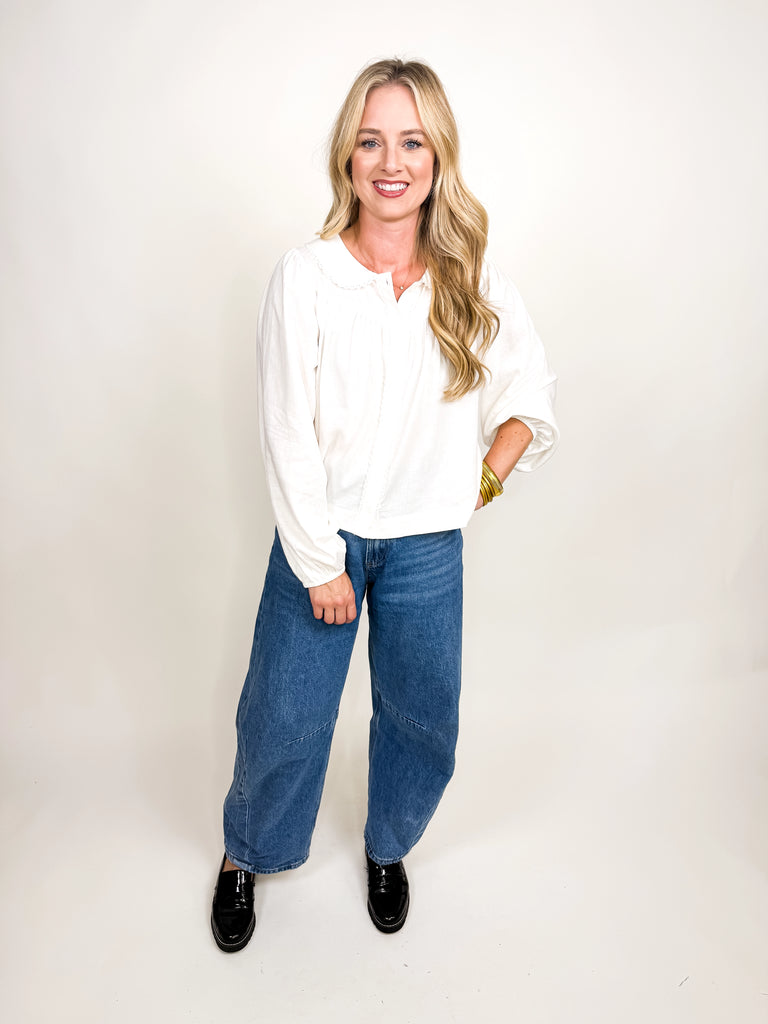 White long sleeve blouse with ruffle collar