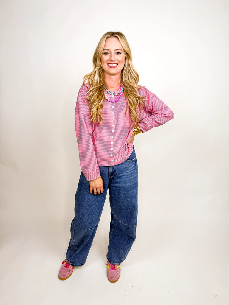 Pink and white striped button-front long sleeve top