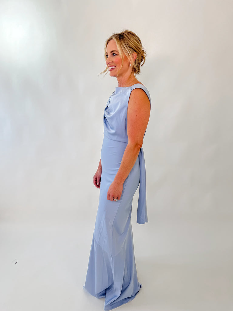 Wisteria satin gown with cowl neckline and draped open back worn by model