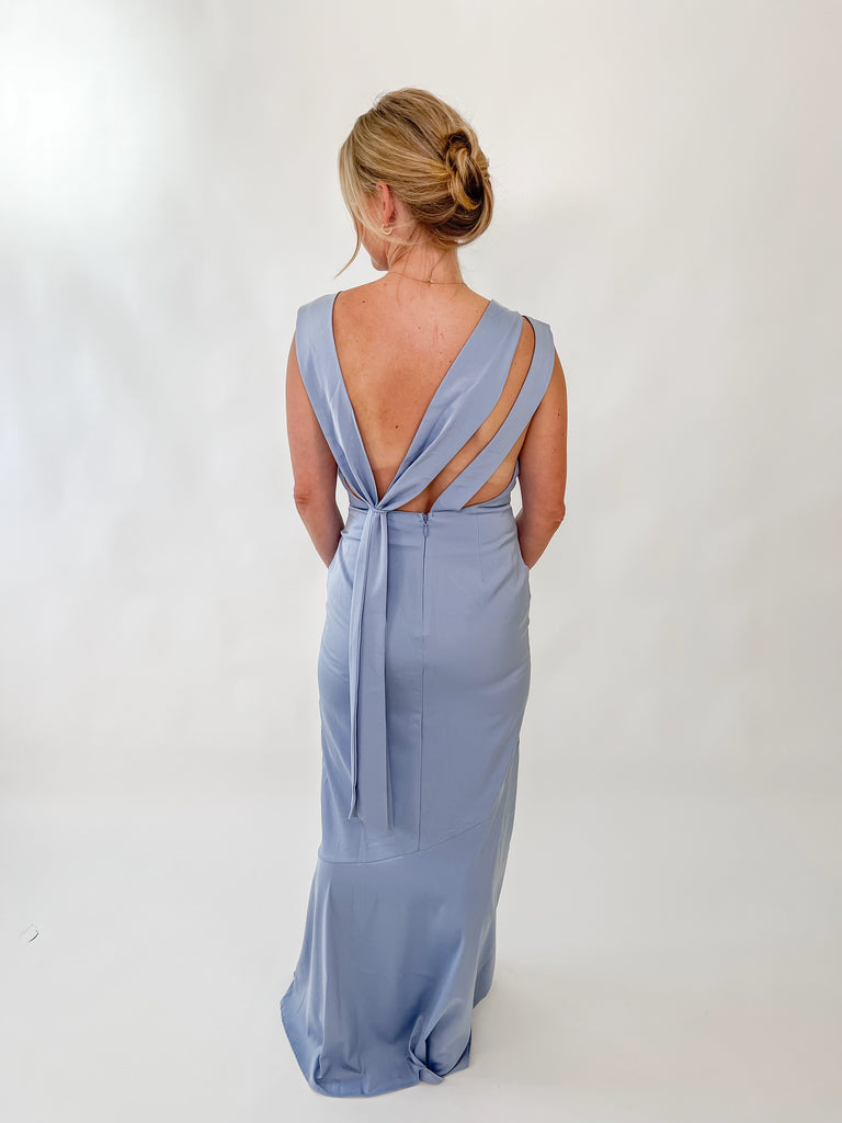 Wisteria satin gown with cowl neckline and draped open back worn by model